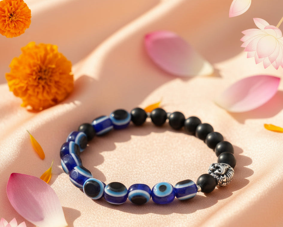 Bracelet with blue and black beads on a white background