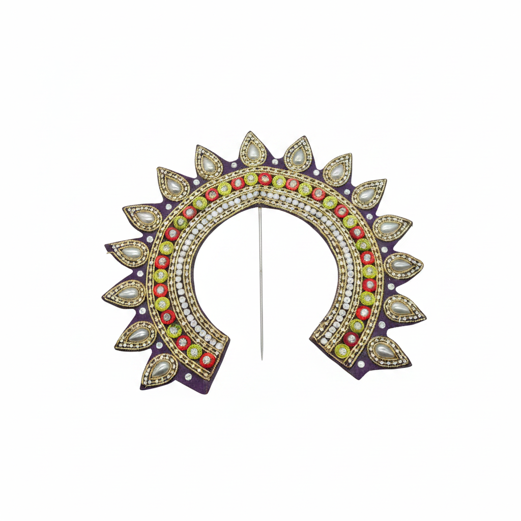 A gold-plated U-shaped decorative brooch or pin embellished with white pearls, red and green stones, and purple enamel, displayed on a dark gray background.