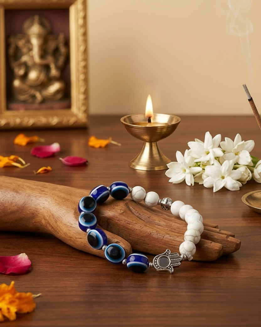 Bracelet with colorful beads on a wooden surface with decorative elements and 'Svasti' branding.