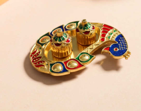 Decorative gold tray with colorful design on a beige surface