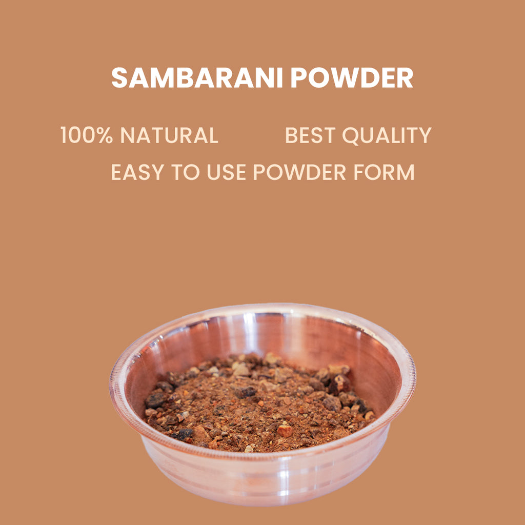A traditional lifestyle image showing a pinch of samrani powder being sprinkled over glowing charcoal inside a brass dhuni burner, producing a clean white aromatic smoke.