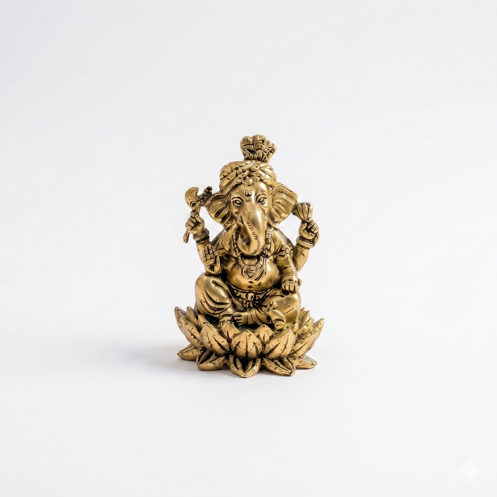 Gold-colored statue of a deity on a white background