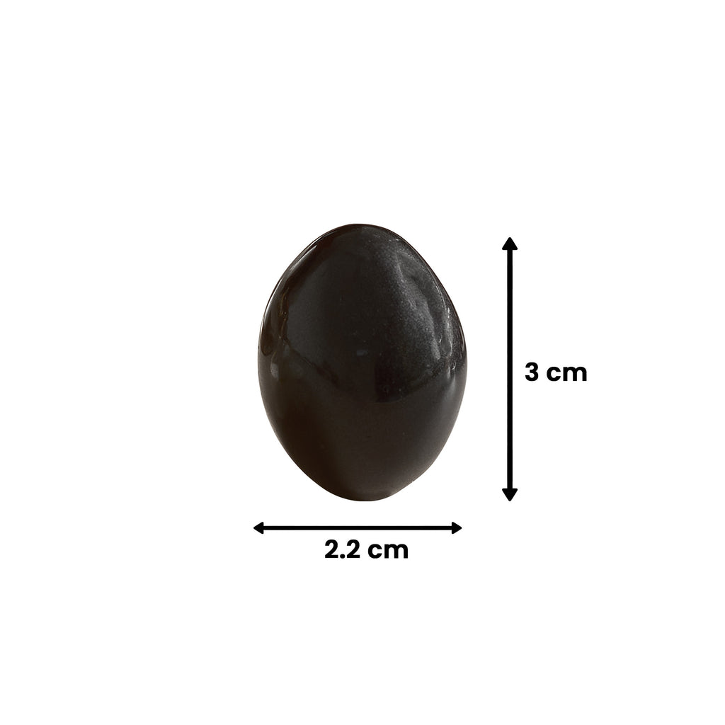 Black stone with measurements on a white background