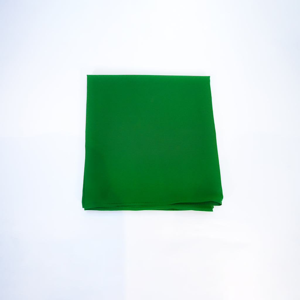Green fabric on a white background