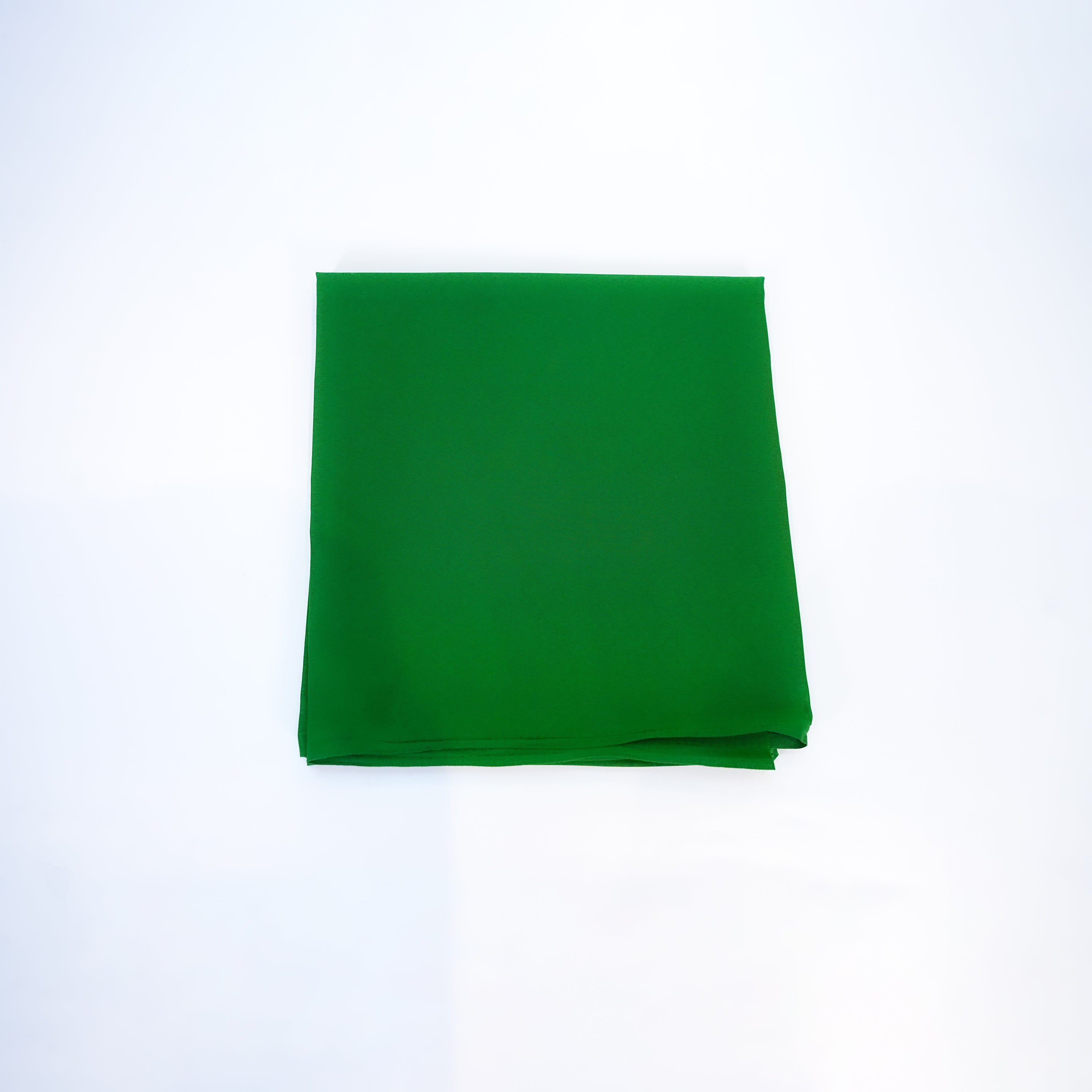 Green fabric on a white background
