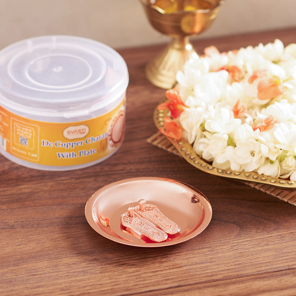 Copper chawal with a container labeled 'Puran Copper Chawal' on a wooden surface.