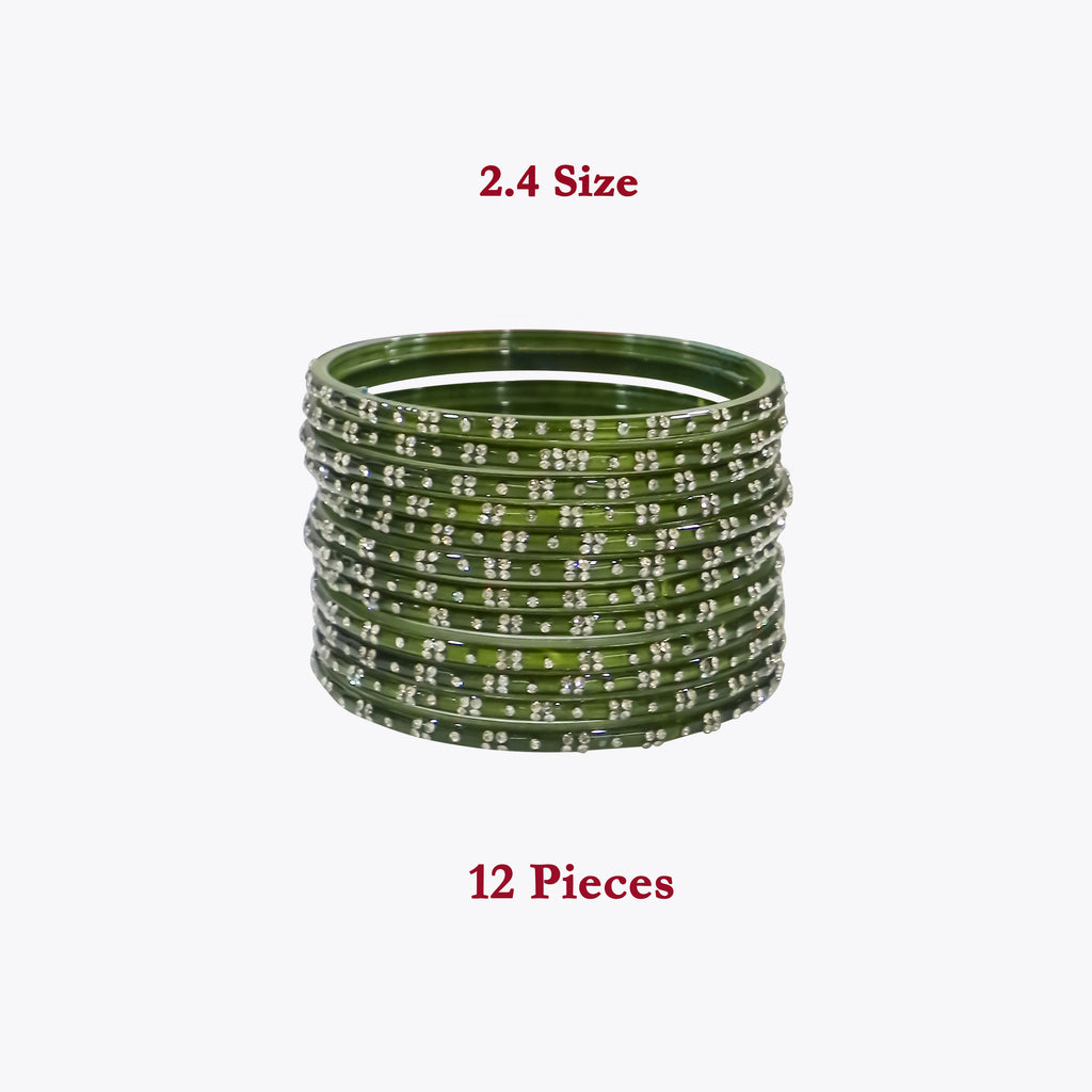 Set of green bangles with silver detailing on a white background