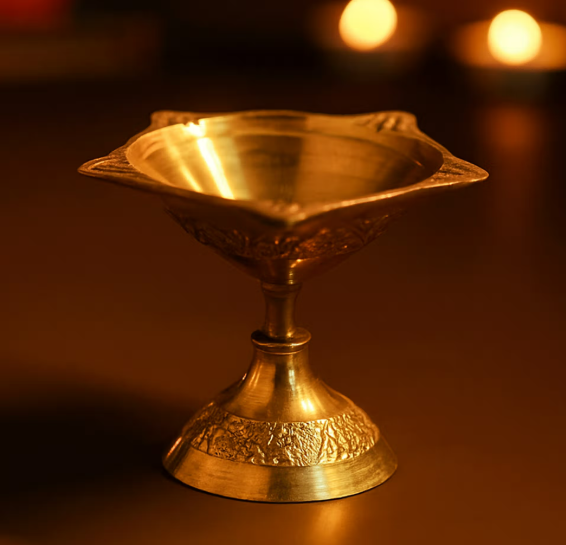 Brass lamp on a dark background with warm lighting