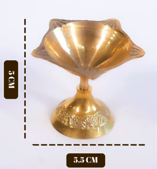 Gold-colored decorative item with dimensions indicated on a white background
