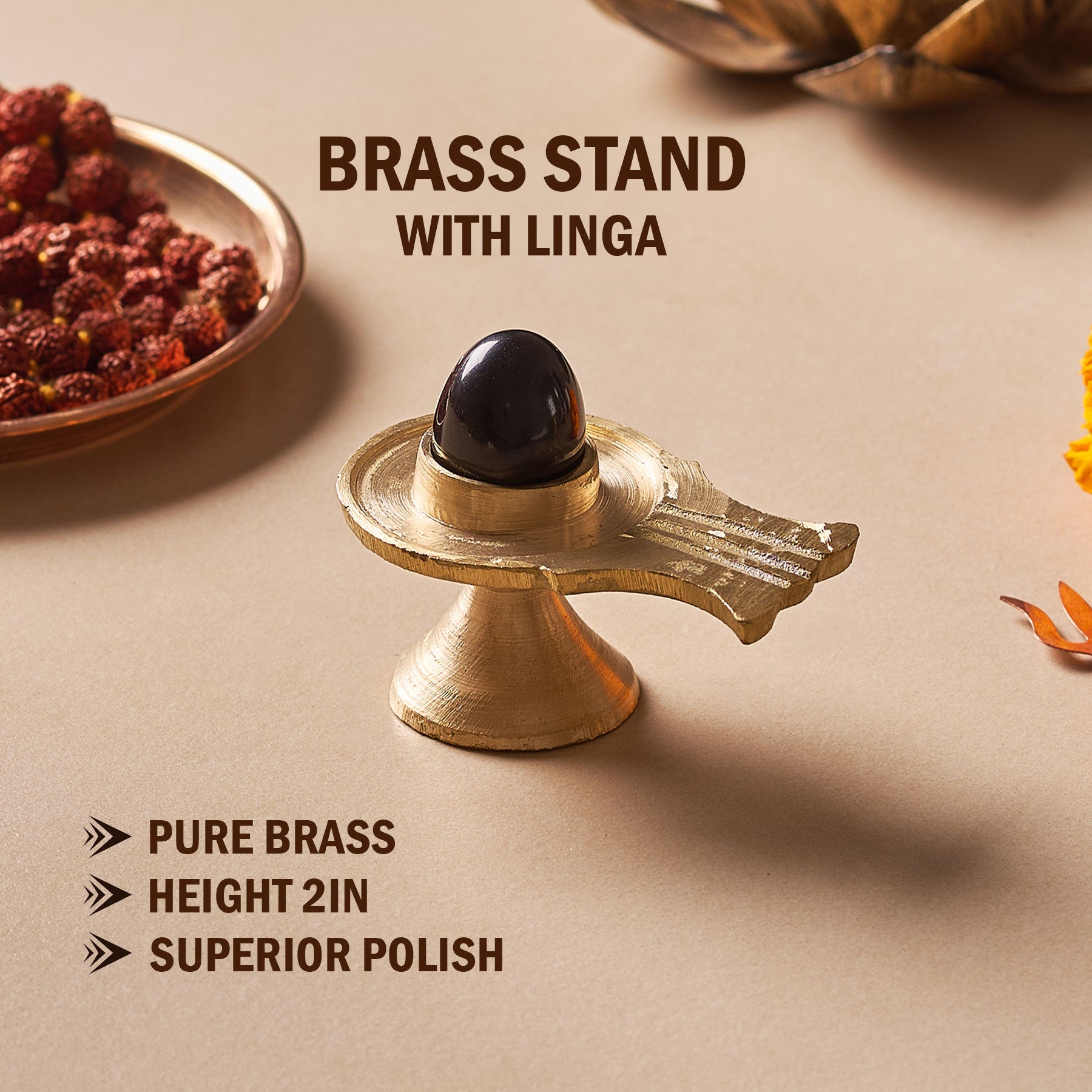 Brass stand with Linga on a beige background