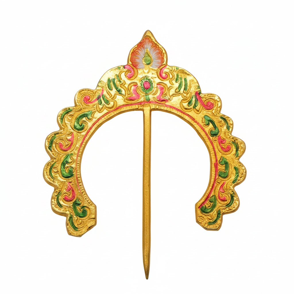 A decorative metal arch with gold, red, and green colors on it, meant for pooja decoration.