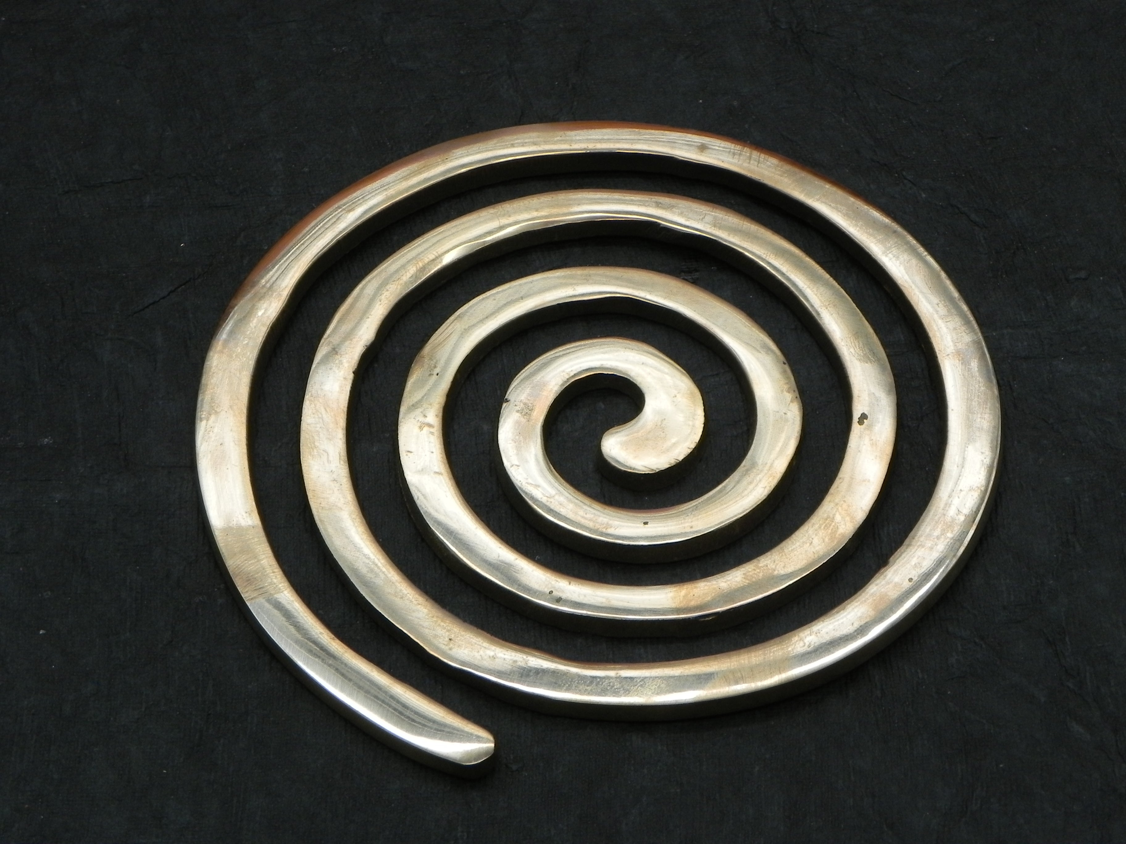 Coil In Brass Vasthu Item