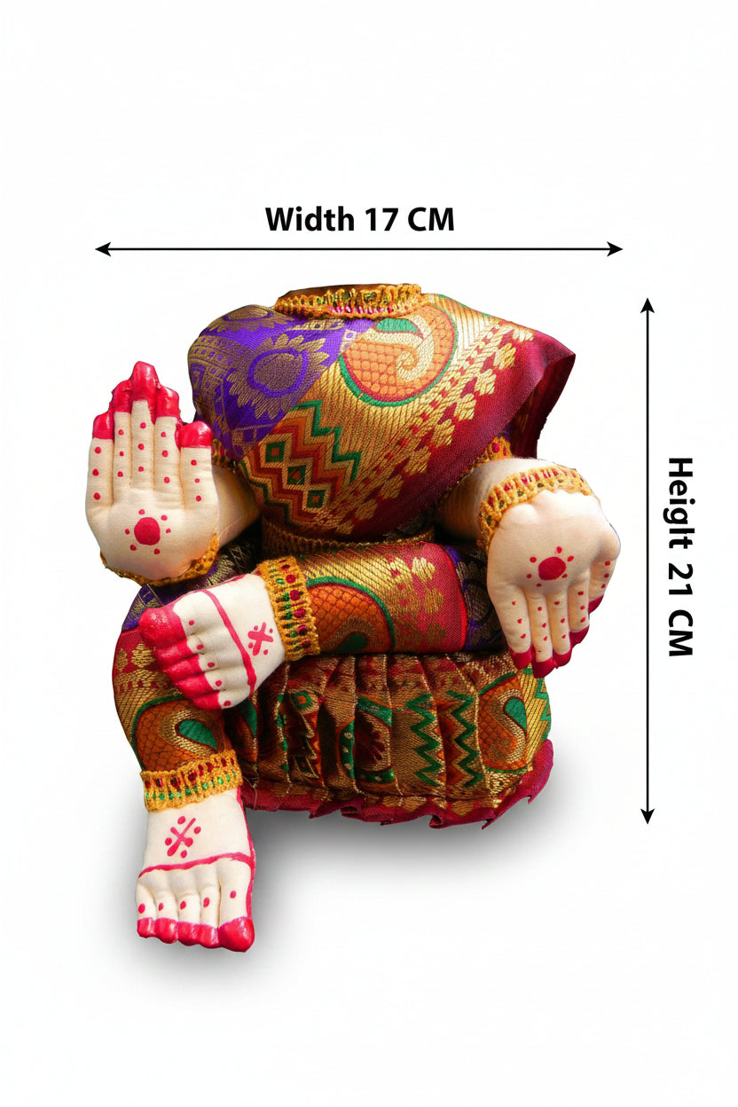 A colorful decorative figurine of a seated figure with patterned fabric and sculpted hands, shown on a white background with dimension arrows labeled width 17 cm and height 21 cm.